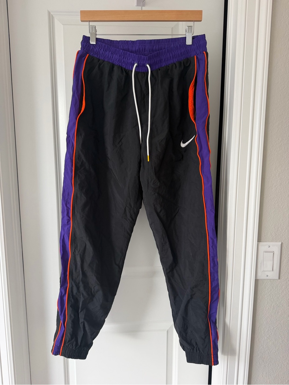 Nike Vintage Black Track Pants with Purple Waistband & Orange Piping